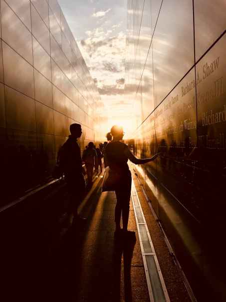 woman touching a black wall